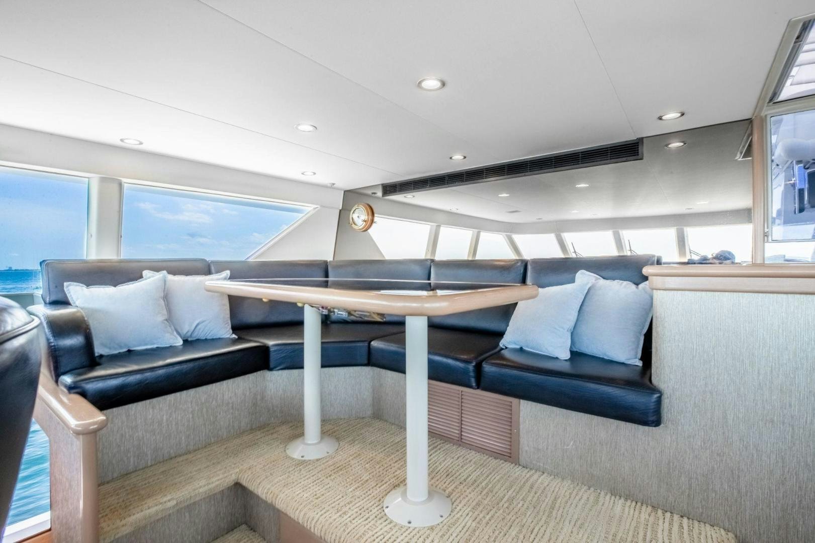 a large room with a pool table aboard CHECKERED PAST Yacht for Sale