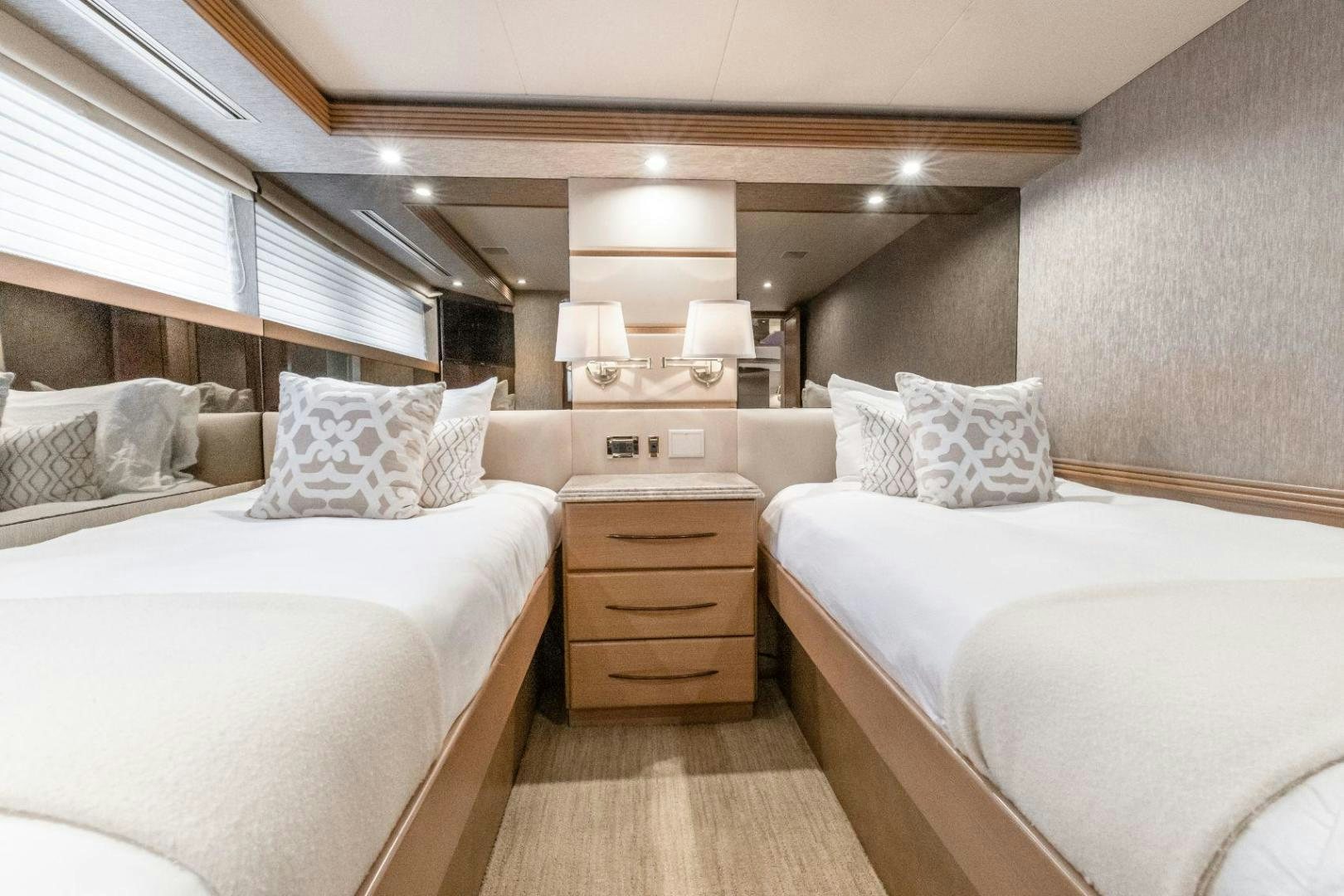 a room with two beds aboard CHECKERED PAST Yacht for Sale