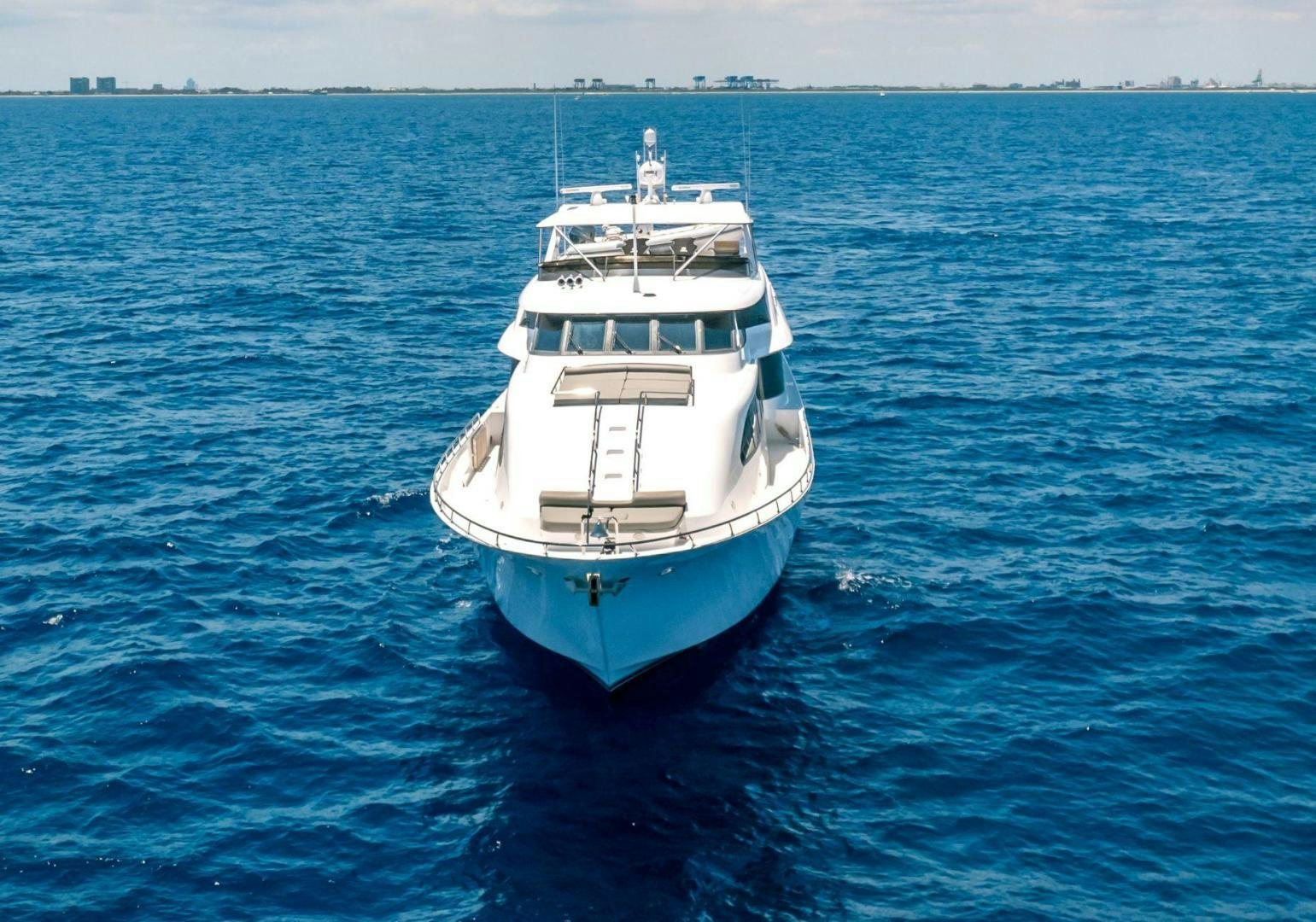 a boat in the water aboard CHECKERED PAST Yacht for Sale