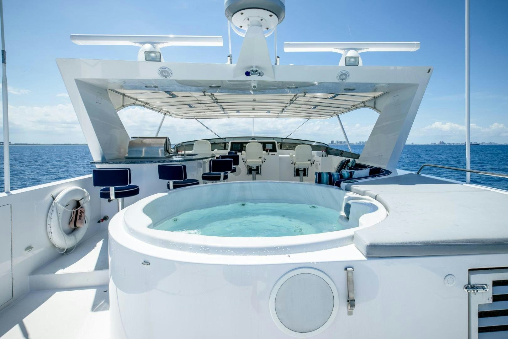 a boat on the water aboard CHECKERED PAST Yacht for Sale