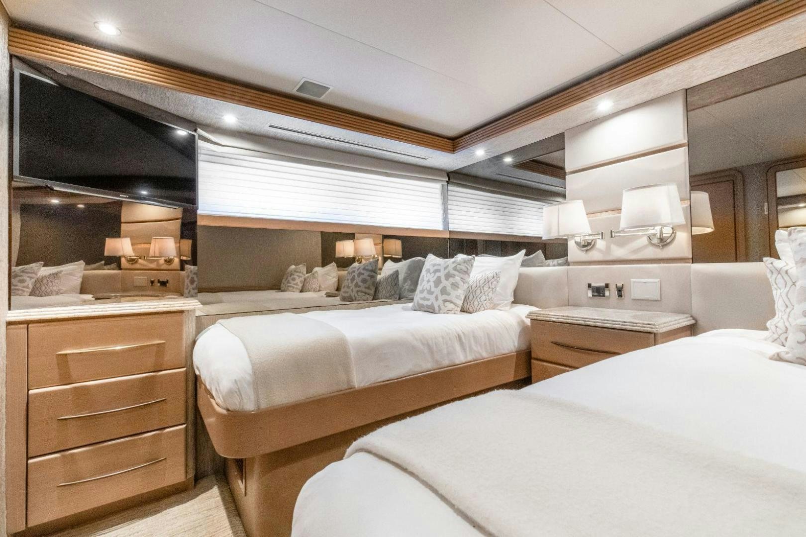 a room with two beds aboard CHECKERED PAST Yacht for Sale