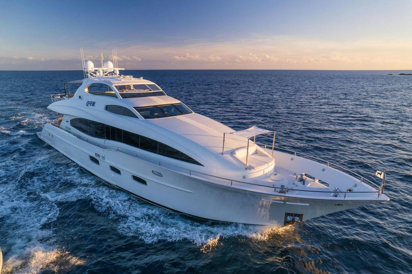 a white yacht on the water aboard NAMASTAY Yacht for Sale