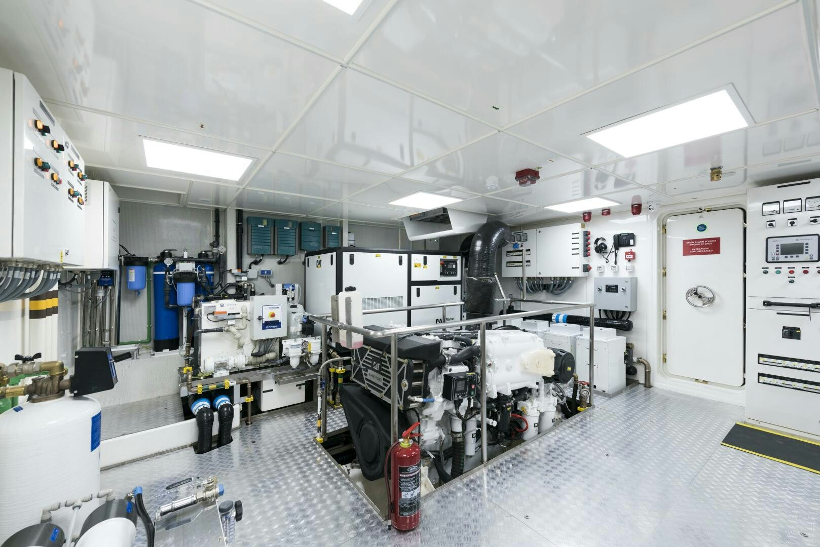 a room with machines and equipment aboard PICCOLO Yacht for Sale