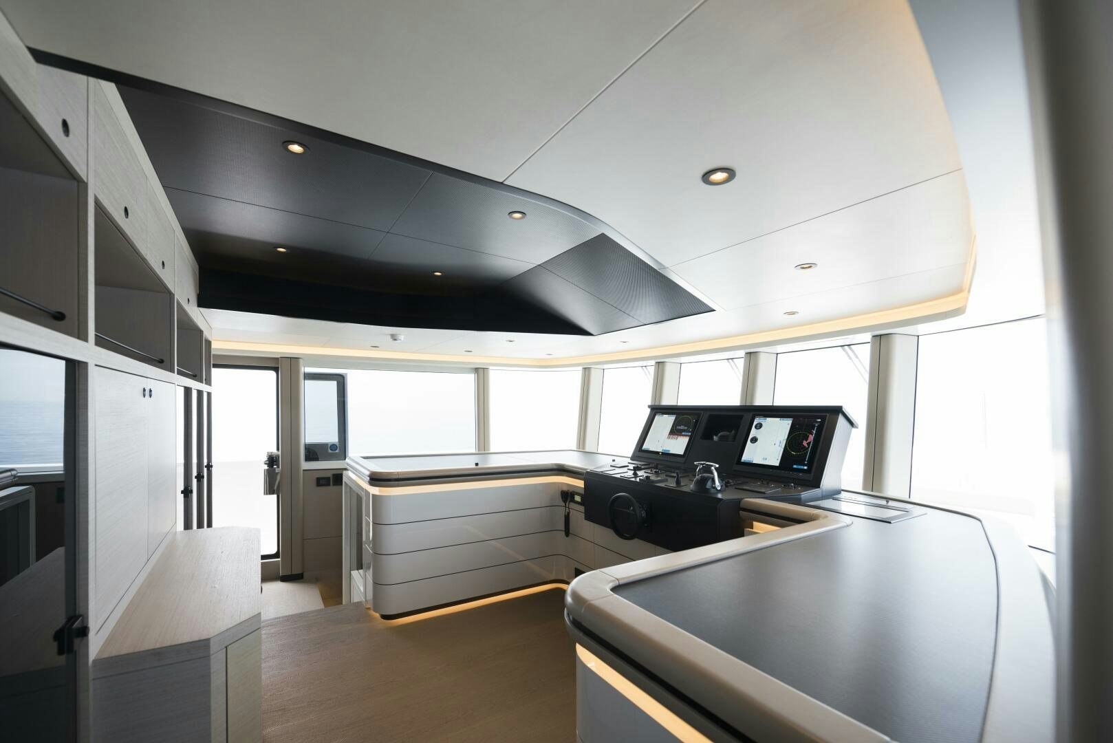 a room with a desk and a computer aboard PICCOLO Yacht for Sale