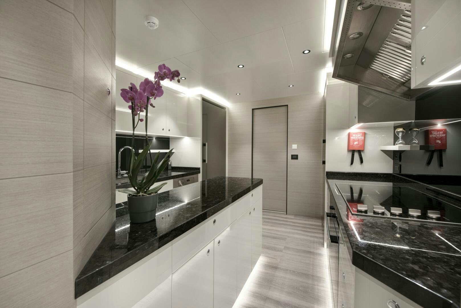 a kitchen with a countertop aboard PICCOLO Yacht for Sale