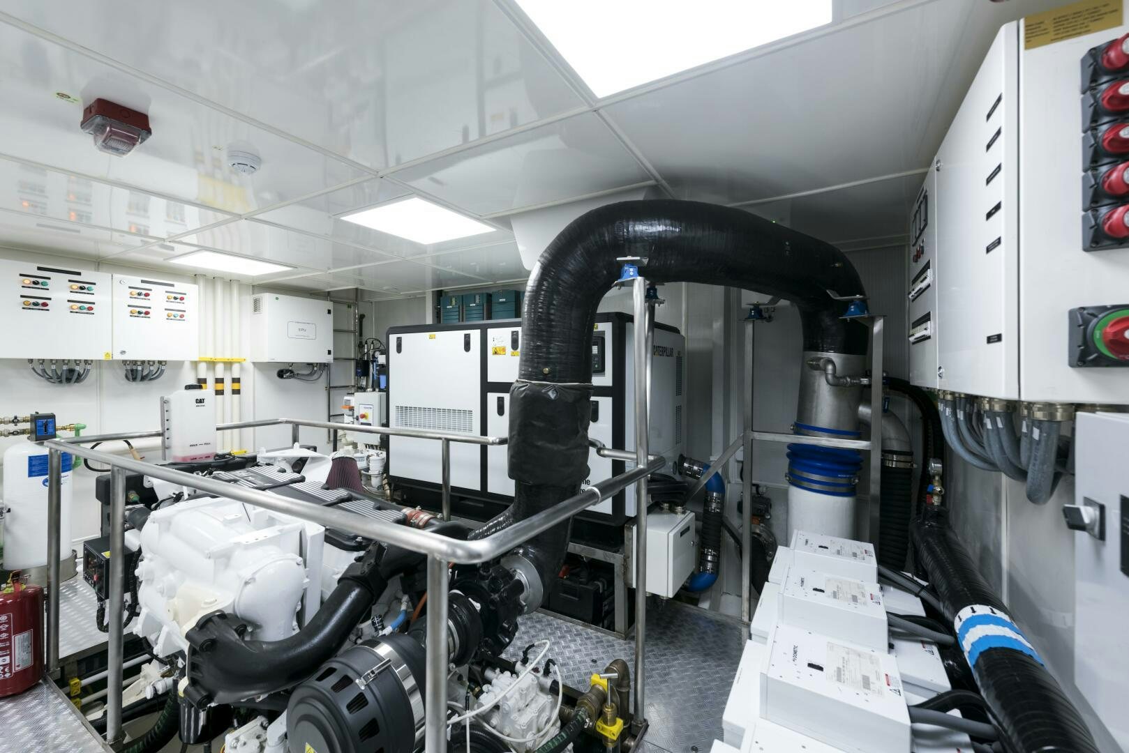 a room with machinery and equipment aboard PICCOLO Yacht for Sale