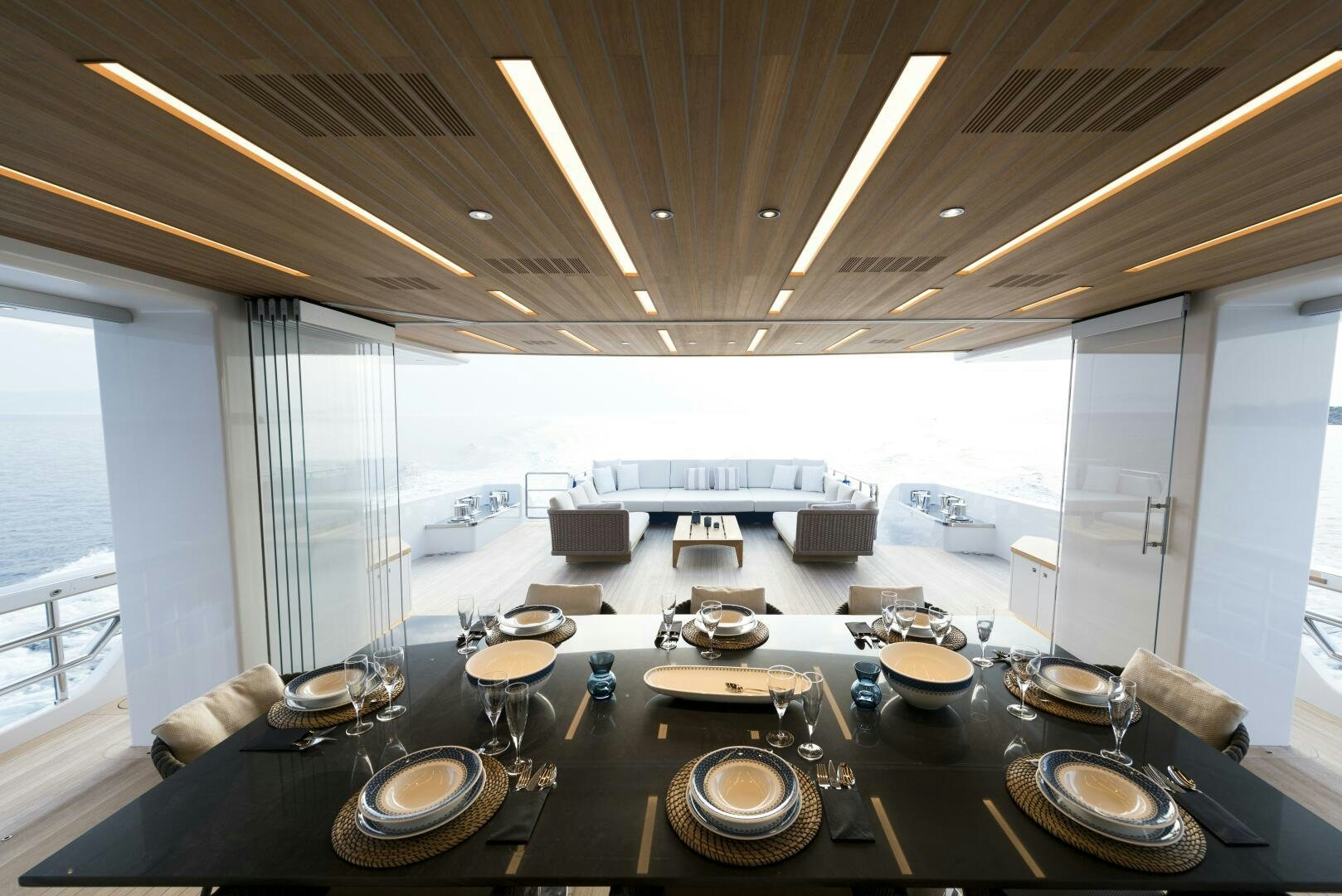a large kitchen with a large table aboard PICCOLO Yacht for Sale
