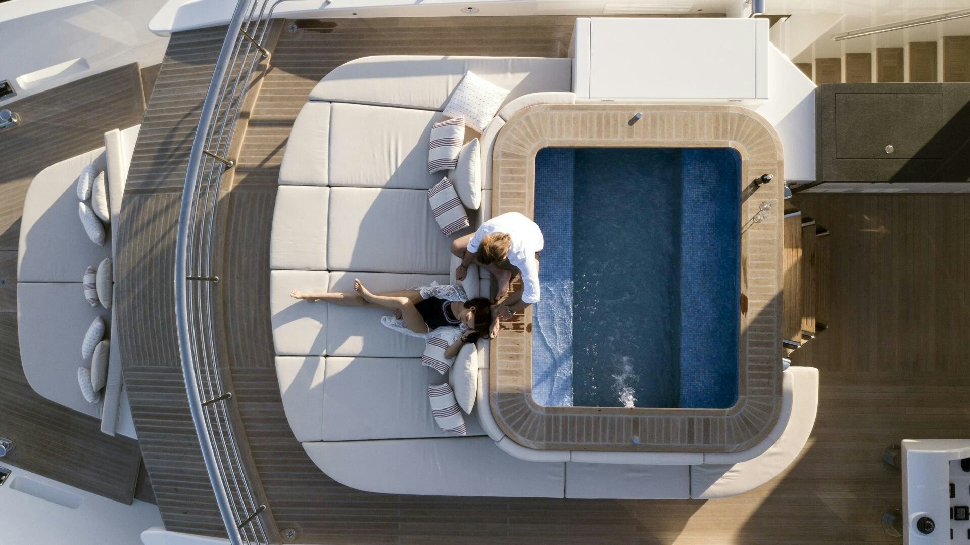 a person climbing a ladder aboard PICCOLO Yacht for Sale