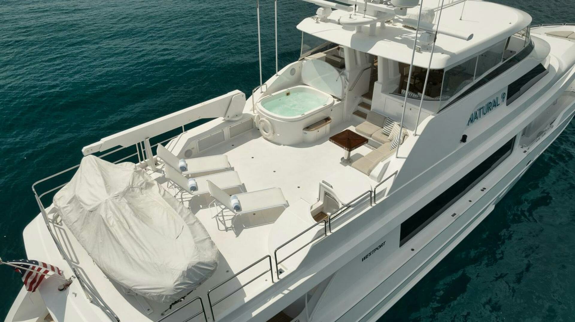 a white boat on the water aboard NATURAL 9 X KALEEN Yacht for Sale