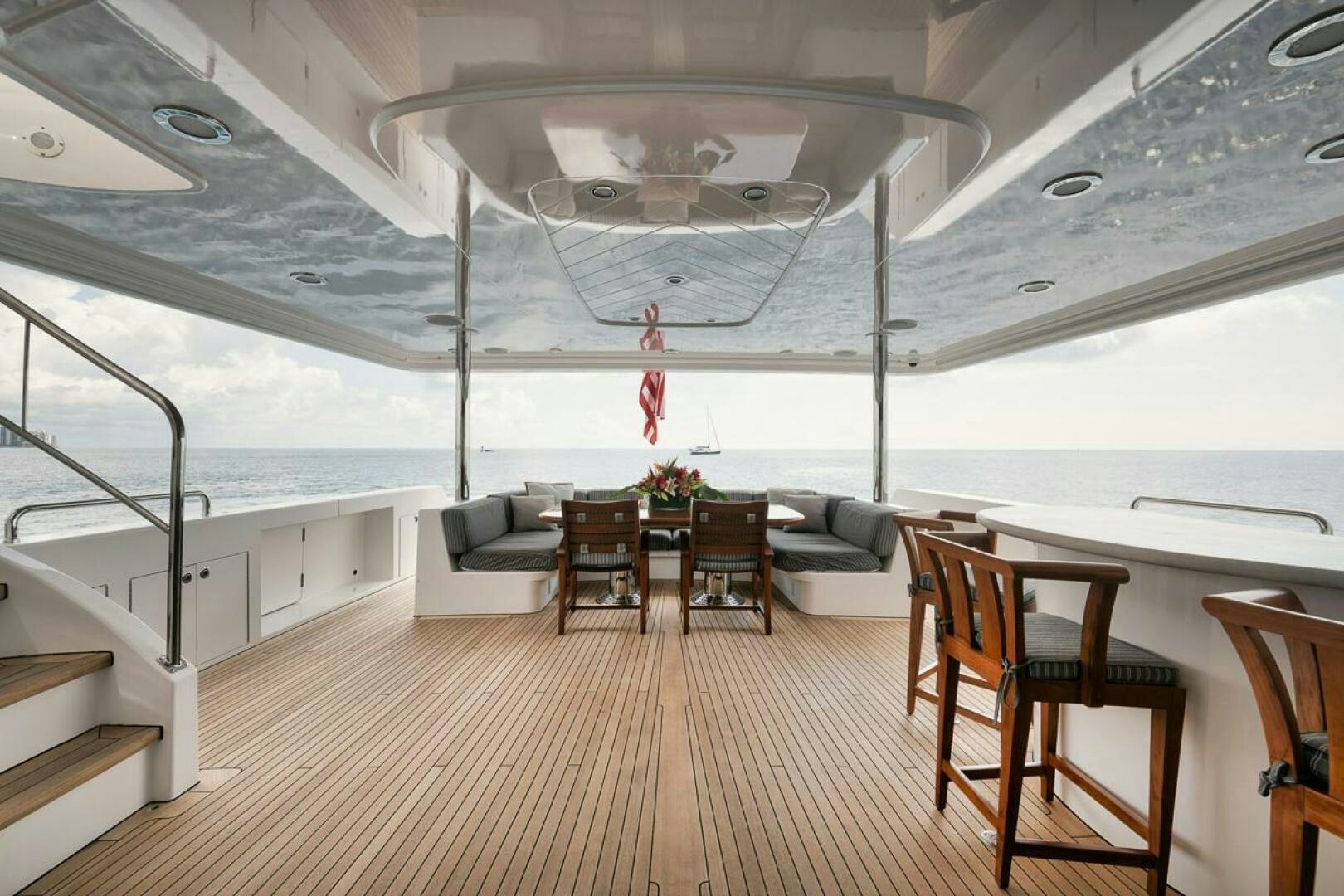 a room with a table and chairs aboard NATURAL 9 X KALEEN Yacht for Sale