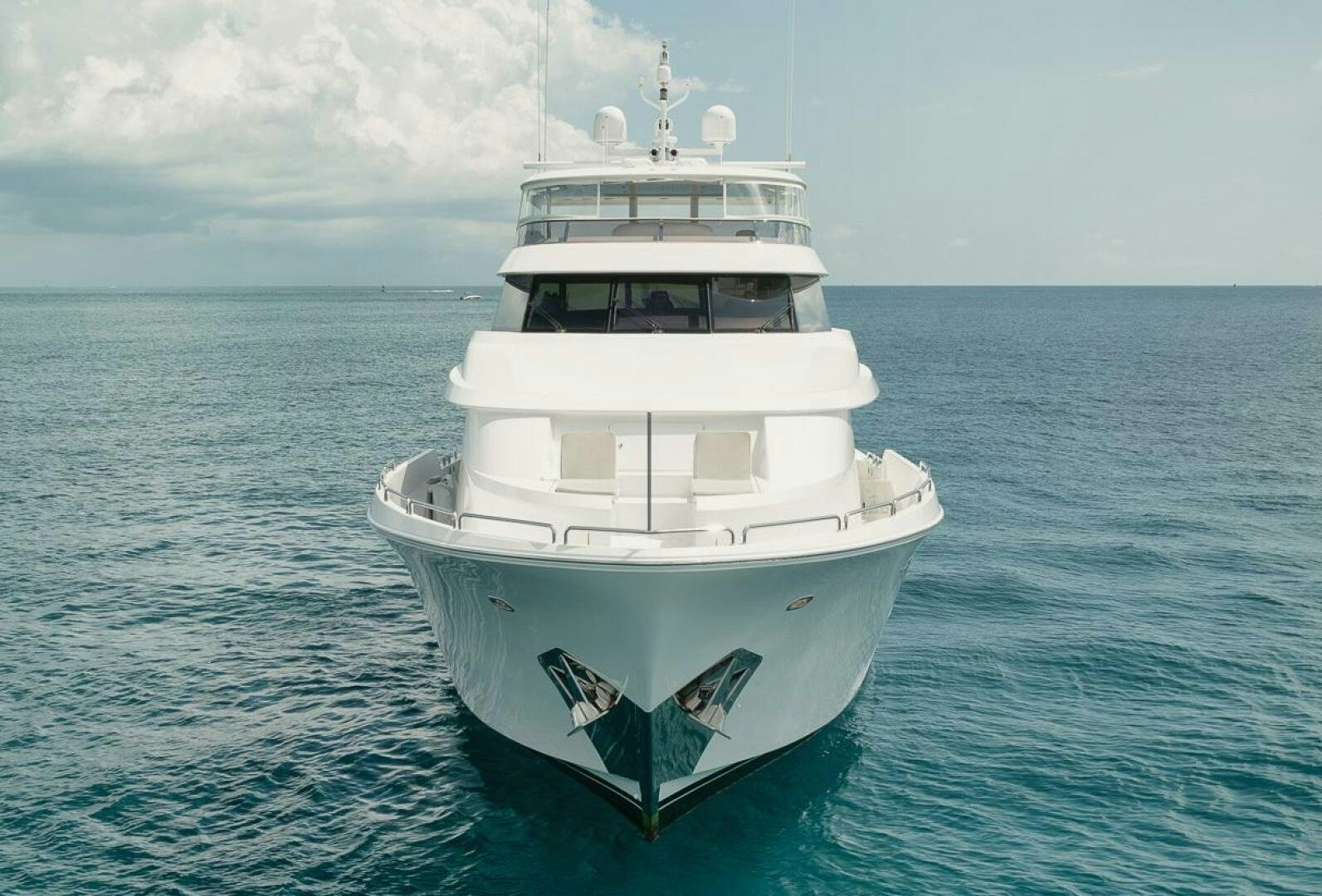 a white boat in the water aboard NATURAL 9 X KALEEN Yacht for Sale