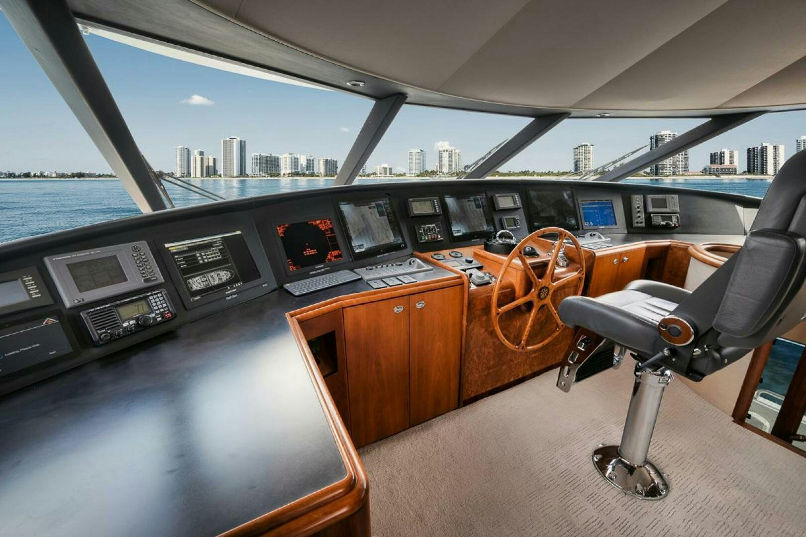 a room with a desk and chairs aboard NATURAL 9 X KALEEN Yacht for Sale