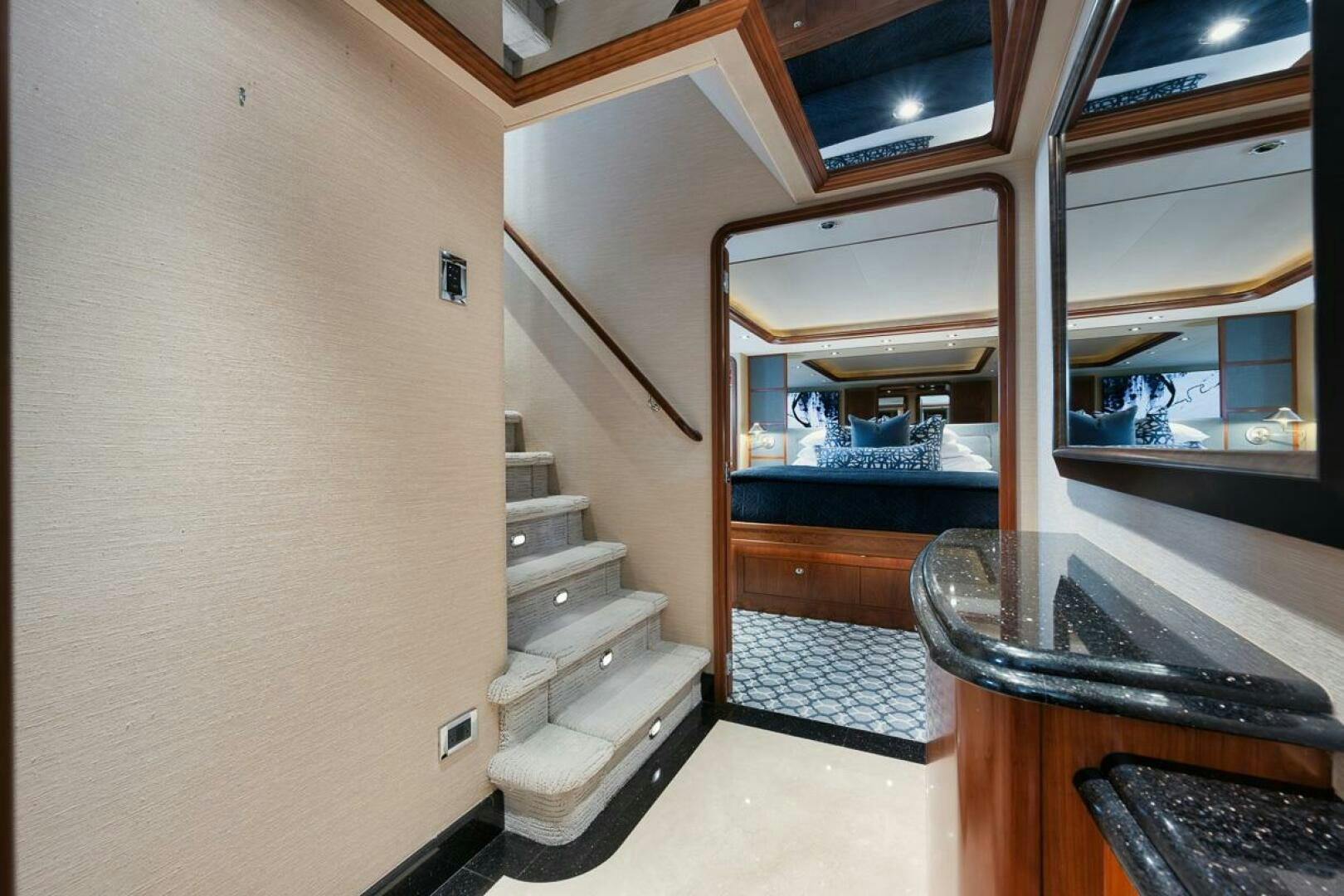 a room with a bunk bed and a desk aboard NATURAL 9 X KALEEN Yacht for Sale