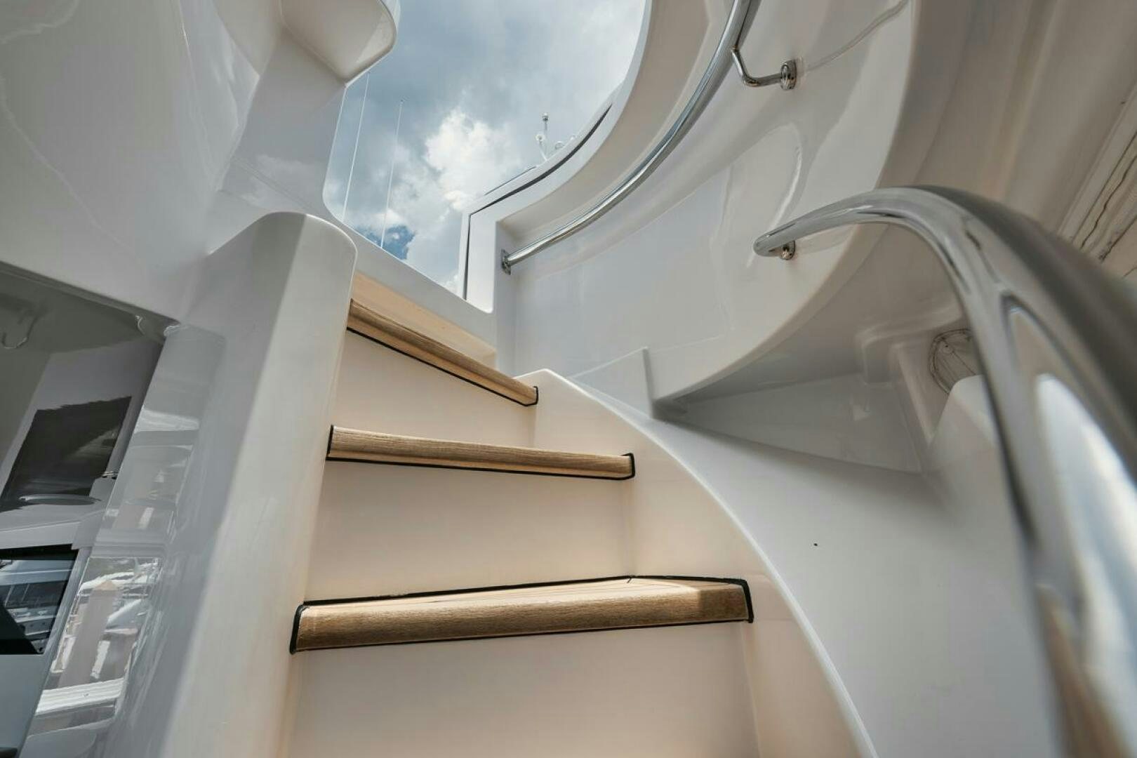 a white sink with a faucet aboard NATURAL 9 X KALEEN Yacht for Sale