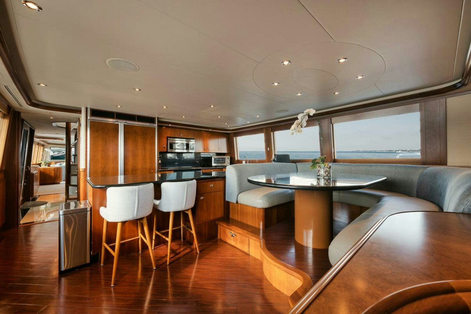 a kitchen and living room aboard NATURAL 9 X KALEEN Yacht for Sale
