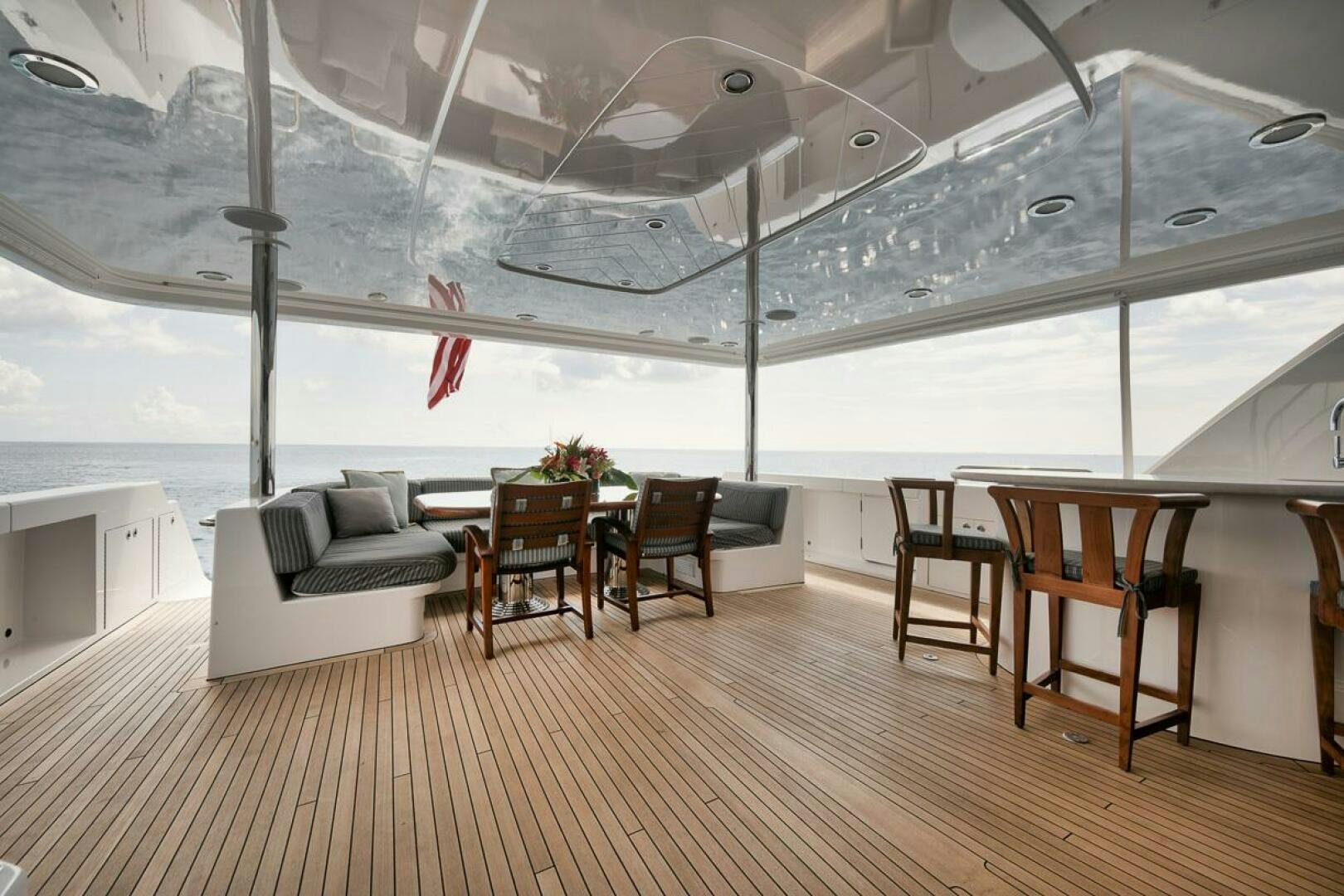 a room with a table and chairs aboard NATURAL 9 X KALEEN Yacht for Sale