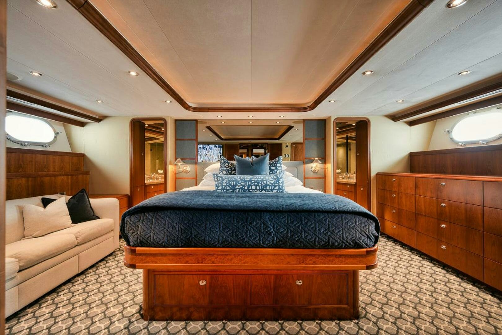 a large bed in a room aboard NATURAL 9 X KALEEN Yacht for Sale