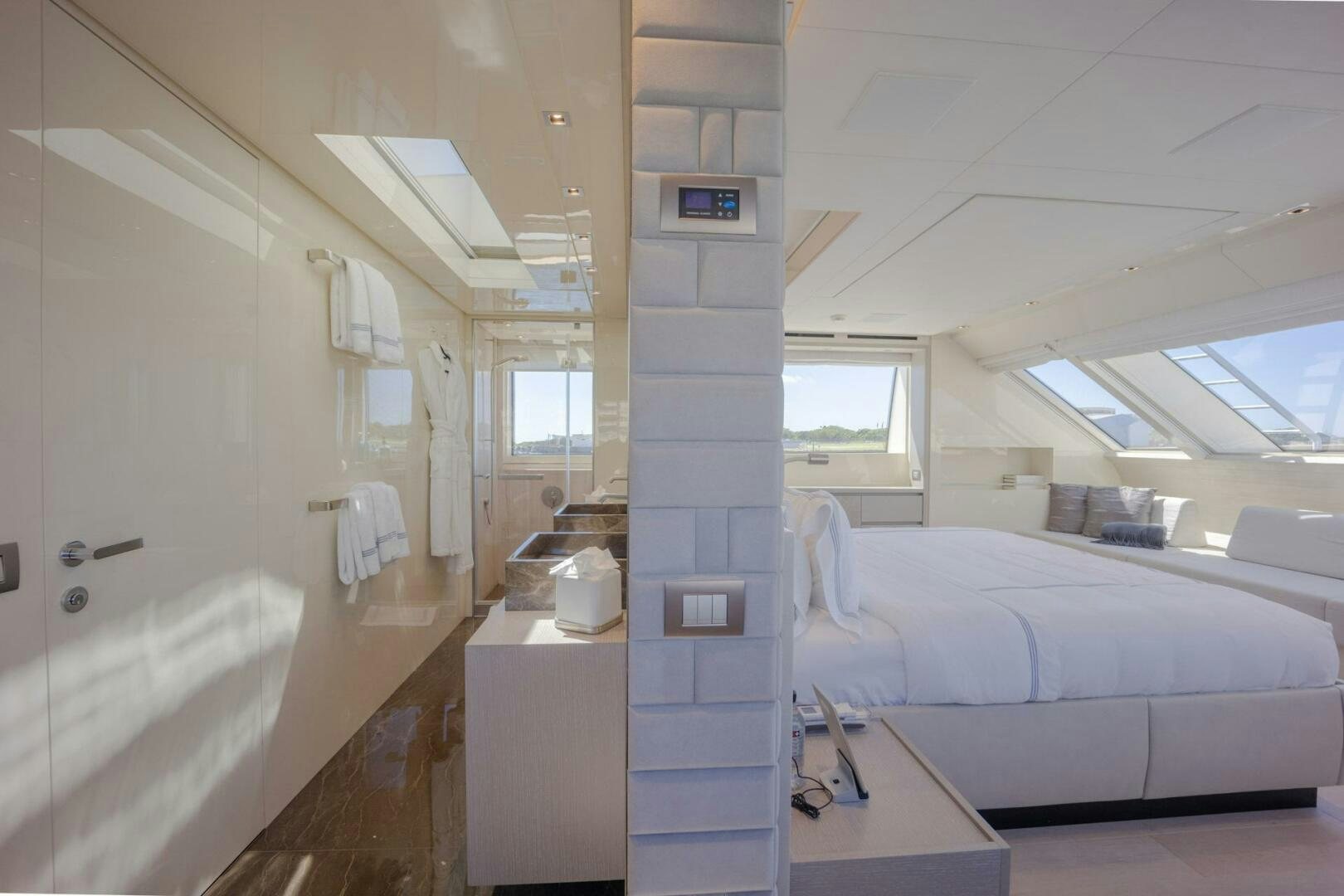 a hospital room with a bed and a sink aboard PHOENIX Yacht for Sale