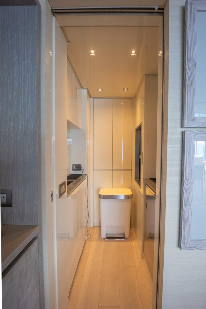 a hallway with a toilet aboard PHOENIX Yacht for Sale