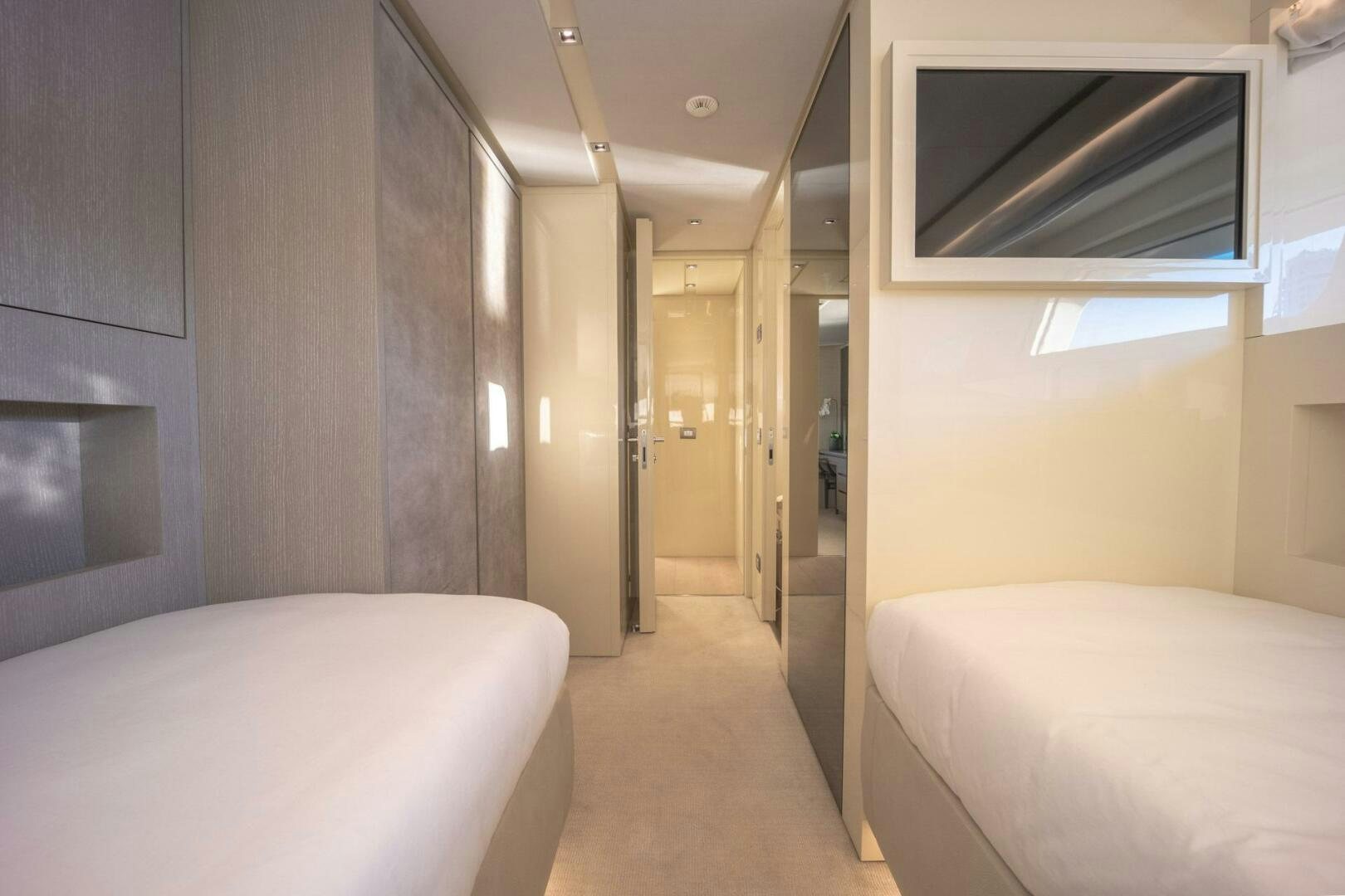 a room with a bed and a hallway aboard PHOENIX Yacht for Sale
