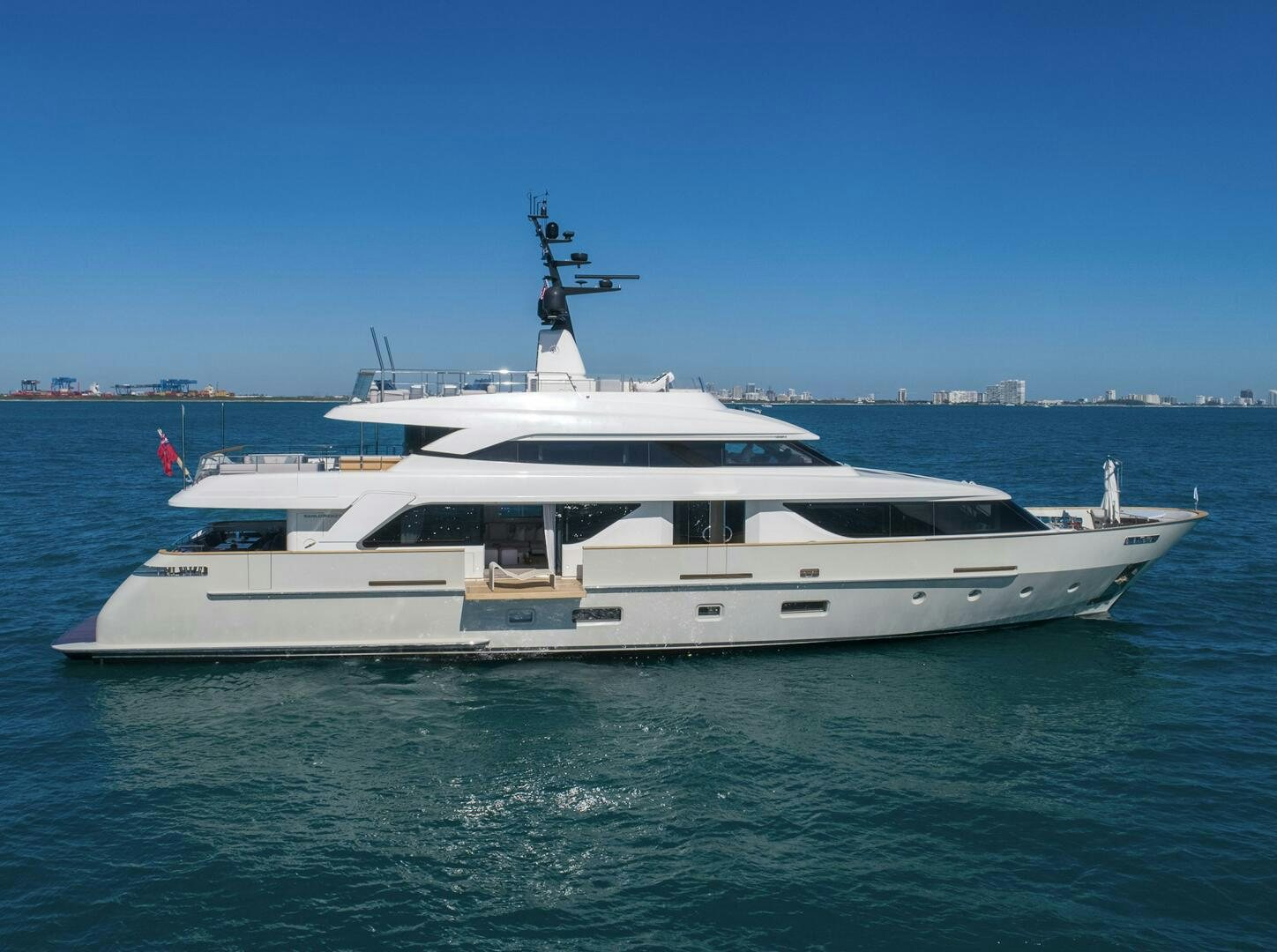 a white yacht in the water aboard PHOENIX Yacht for Sale