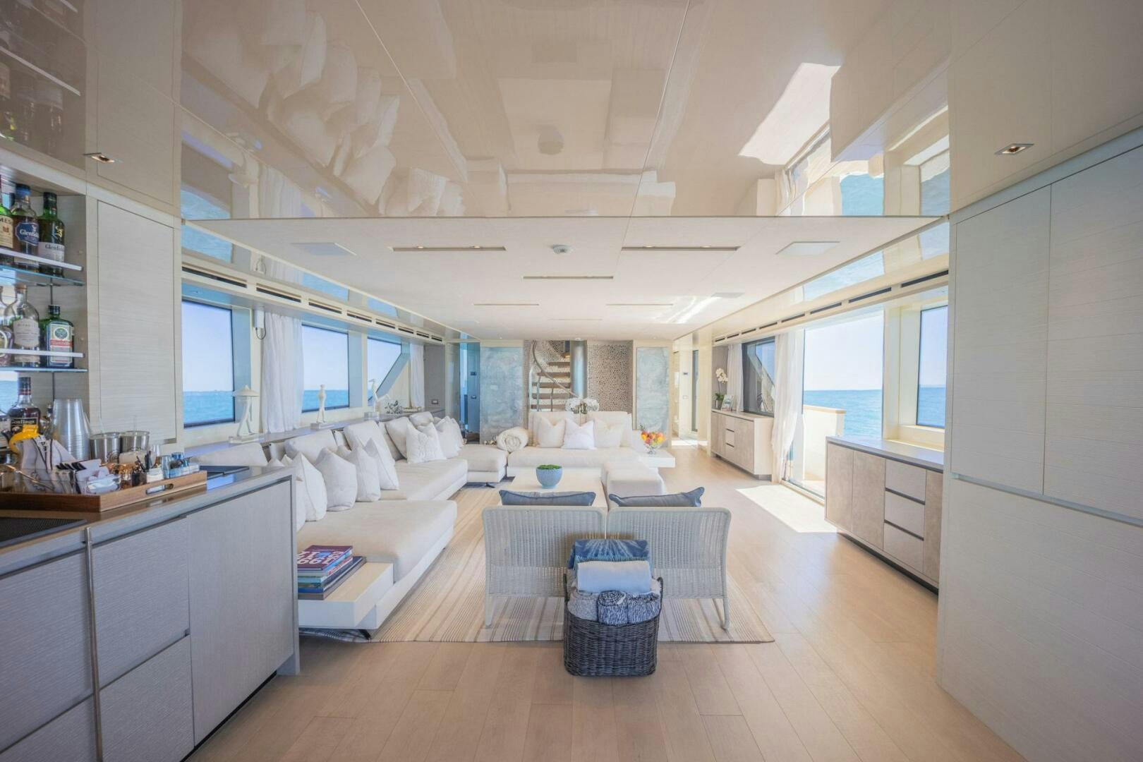 a room with a couch and a table and a tv aboard PHOENIX Yacht for Sale