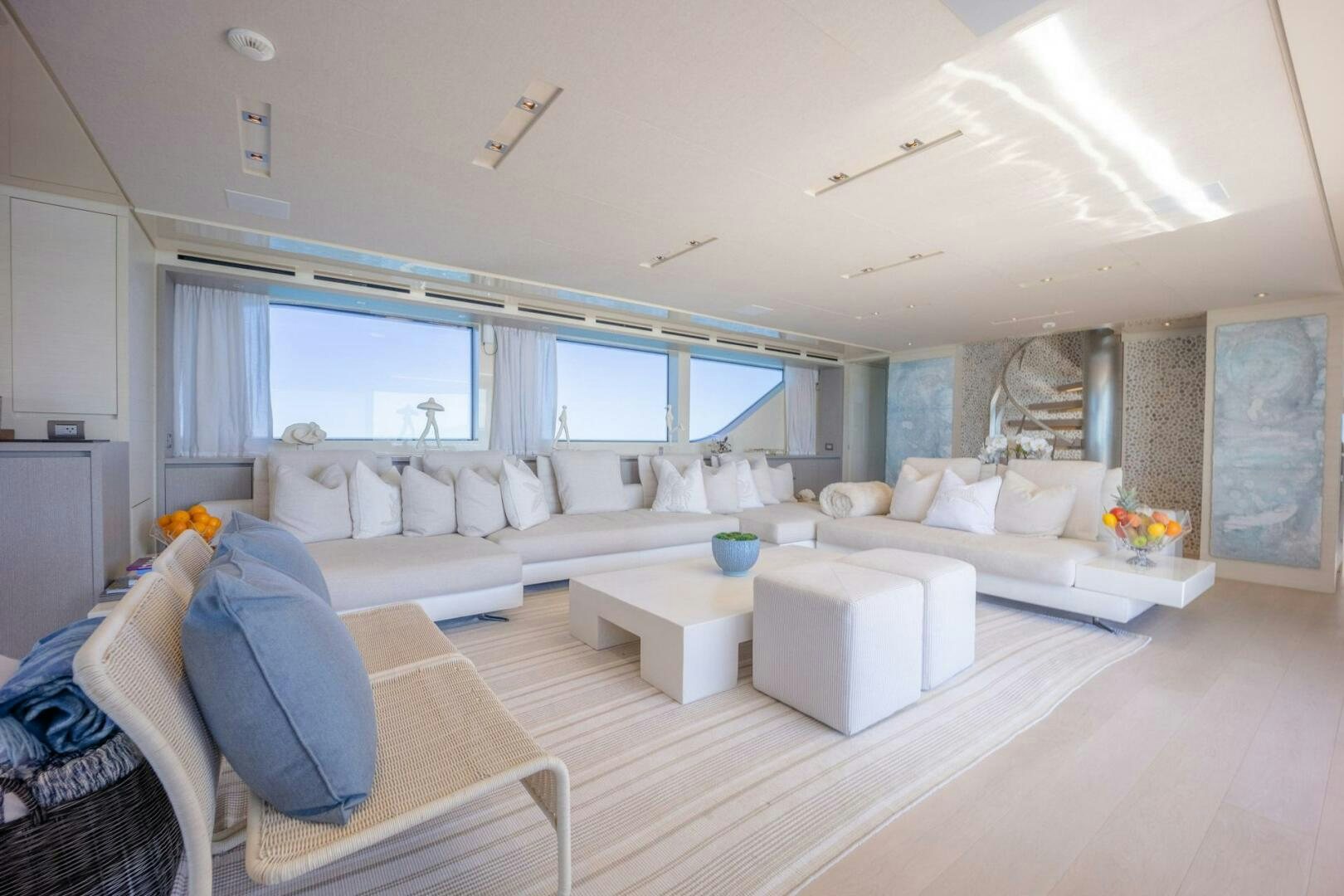 a living room with a large window aboard PHOENIX Yacht for Sale