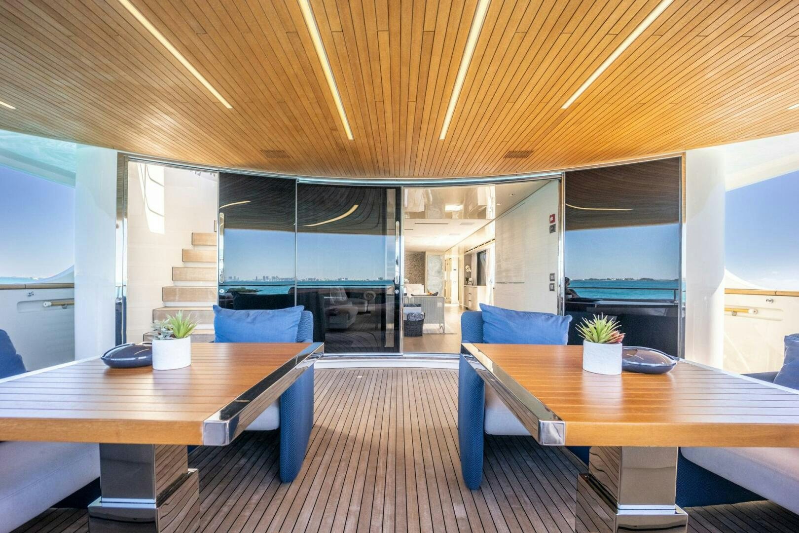 a room with a table and chairs aboard PHOENIX Yacht for Sale
