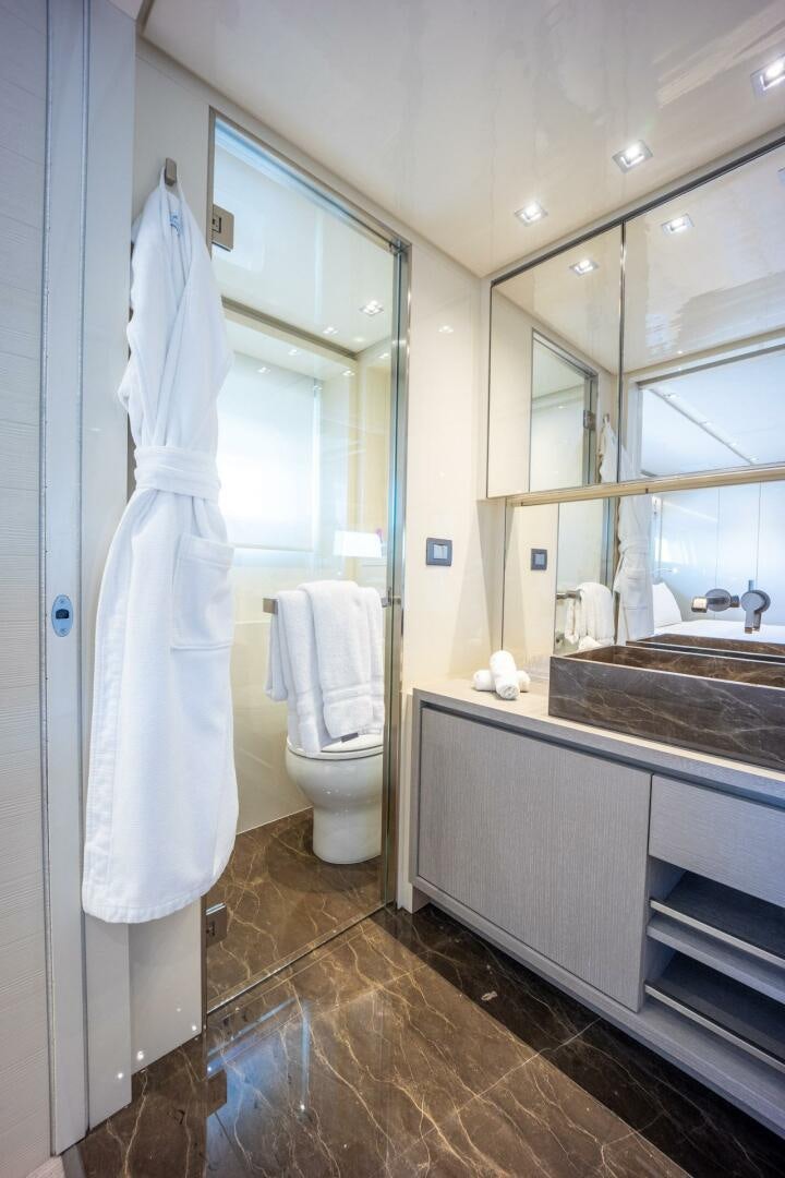 a bathroom with a shower and a sink aboard PHOENIX Yacht for Sale