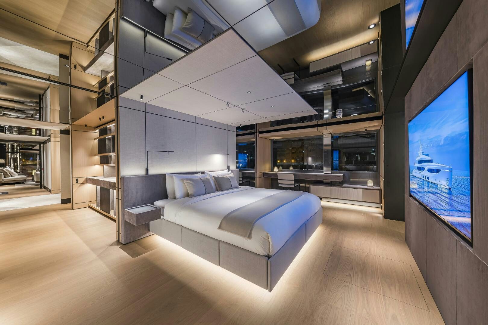 a room with a couch and a tv aboard CONRAD C144S HULL 4 Yacht for Sale