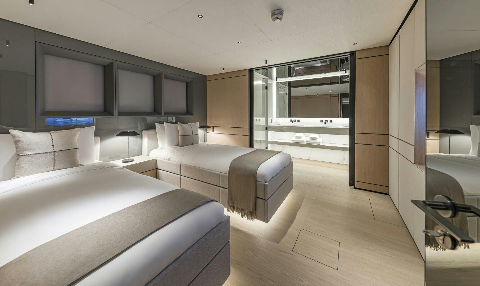 a room with a bed and a tv on the wall aboard CONRAD C144S HULL 4 Yacht for Sale