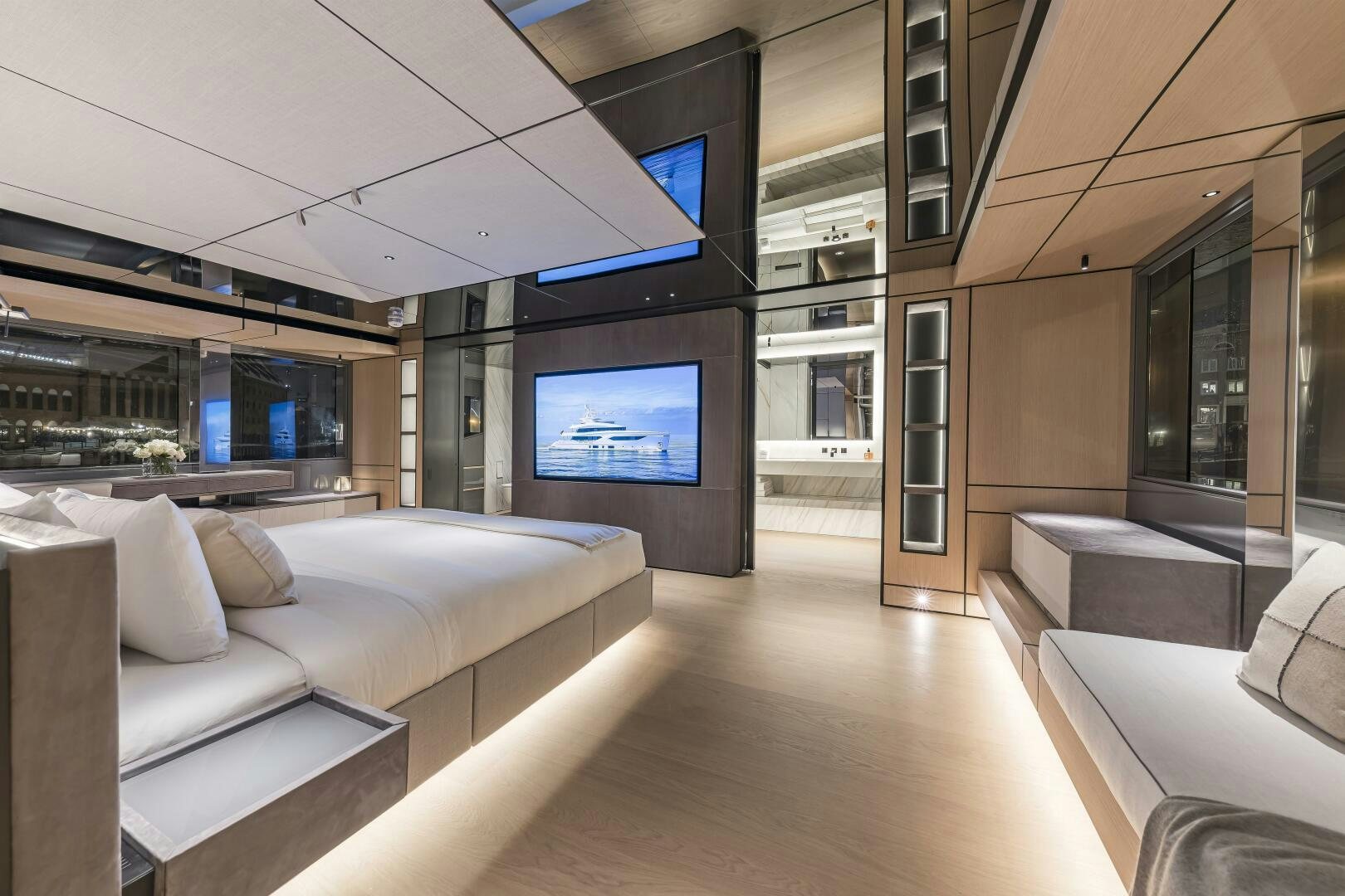 a room with a couch and a tv on the wall aboard CONRAD C144S HULL 4 Yacht for Sale