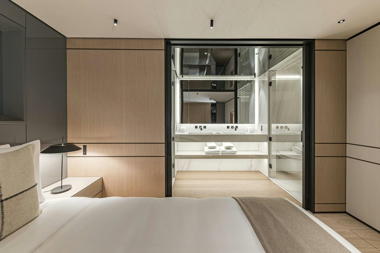 a room with a bed and a closet aboard CONRAD C144S HULL 4 Yacht for Sale