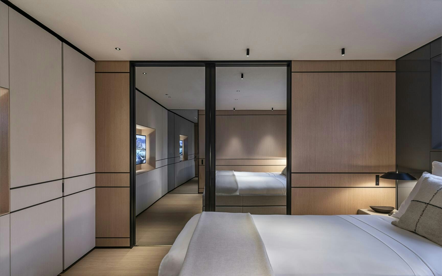 a room with a bed and a closet aboard CONRAD C144S HULL 4 Yacht for Sale