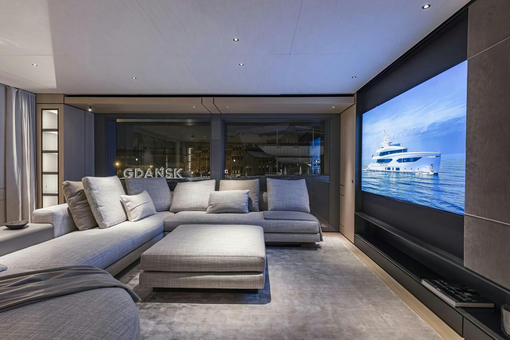 a living room with a large window aboard CONRAD C144S HULL 4 Yacht for Sale