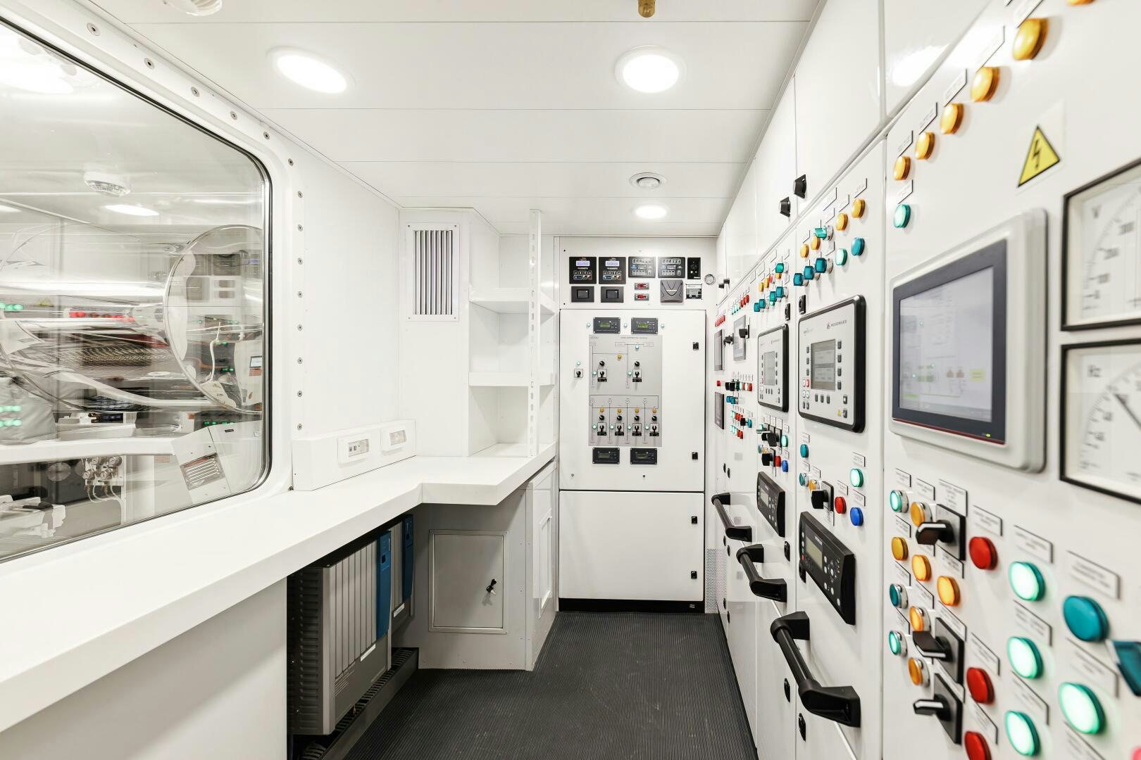 a room with white cabinets and white walls aboard CONRAD C144S HULL 4 Yacht for Sale