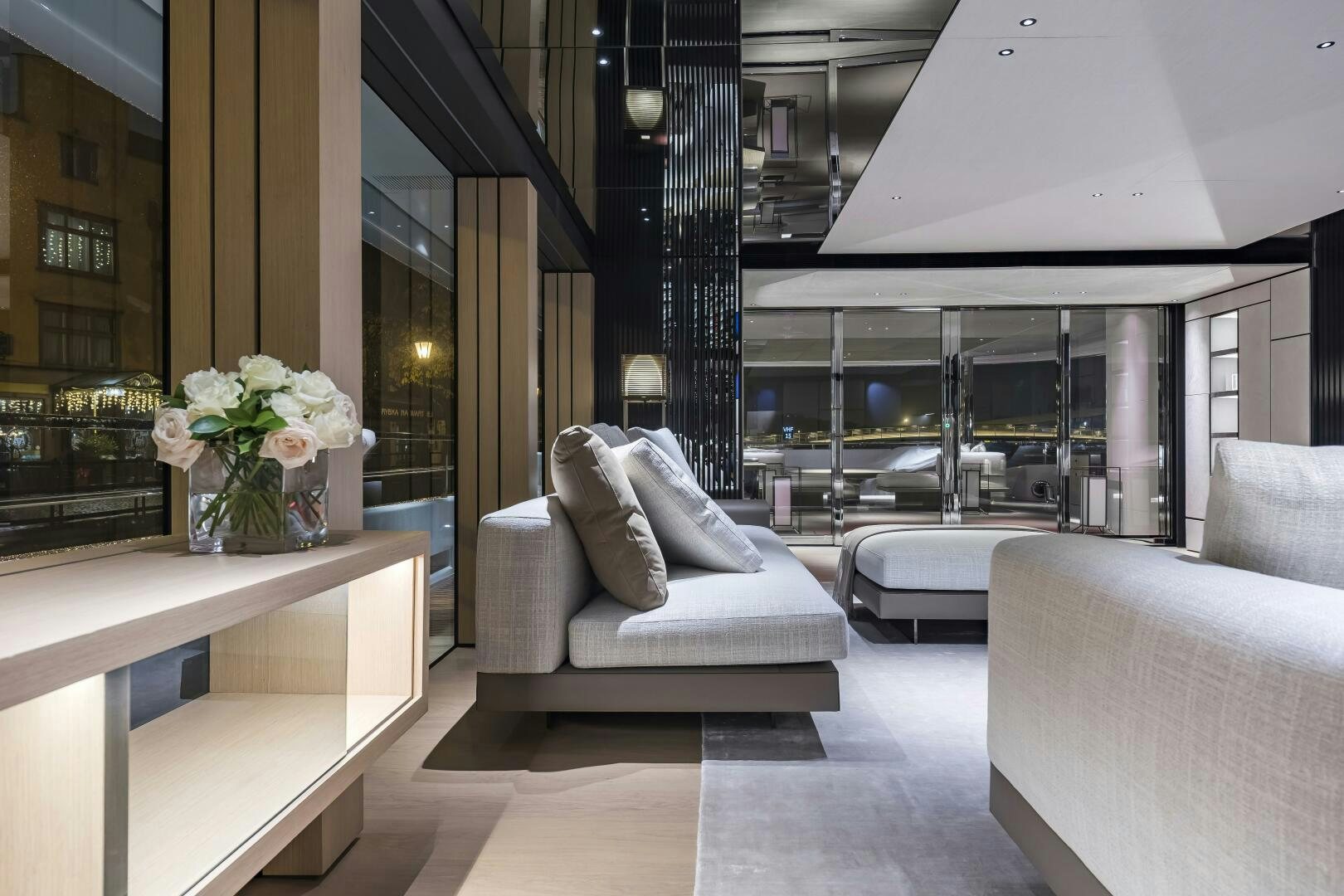 a room with a table and chairs aboard CONRAD C144S HULL 4 Yacht for Sale