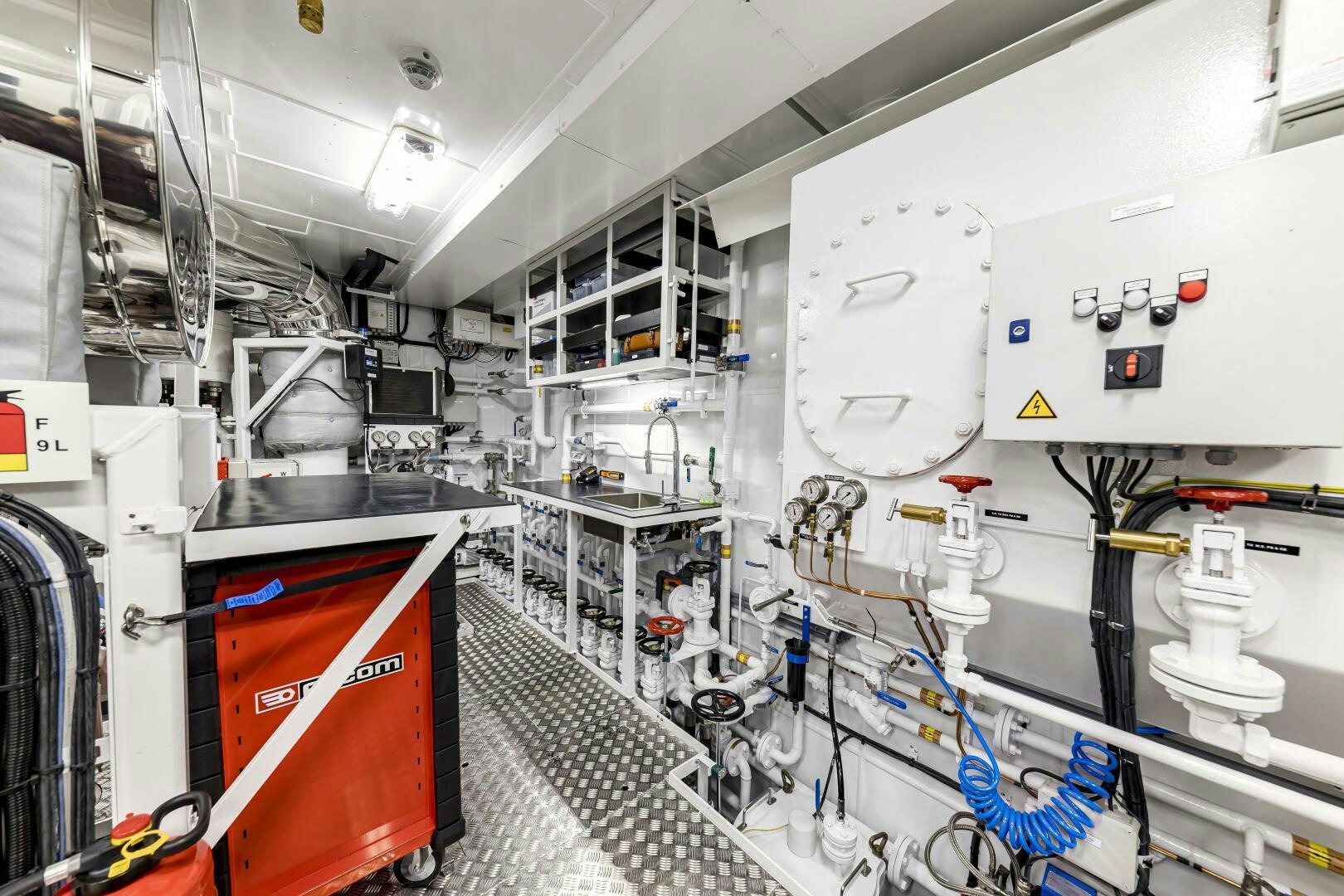 a room with several machines aboard CONRAD C144S HULL 4 Yacht for Sale