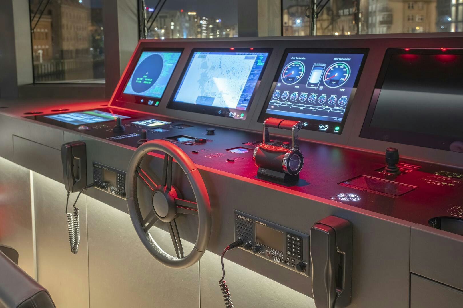 a table with monitors and a camera aboard CONRAD C144S HULL 4 Yacht for Sale