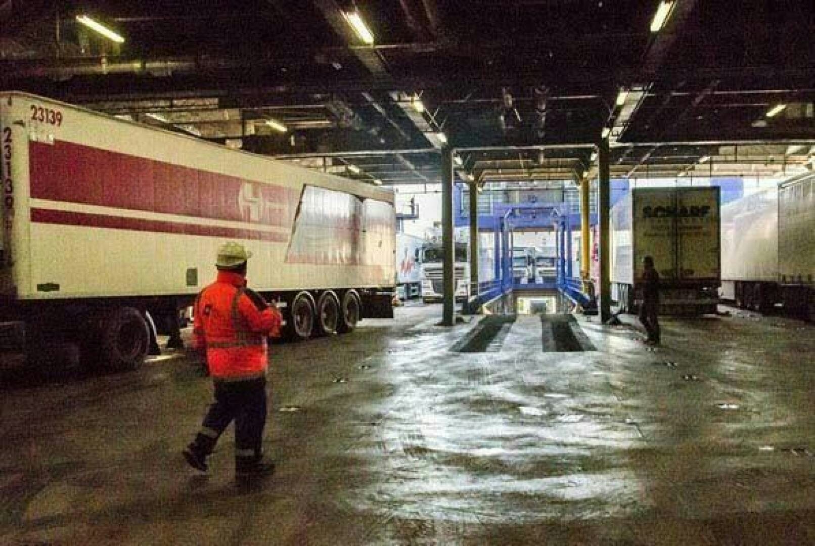 a person walking in a warehouse aboard KAUNAS Yacht for Sale
