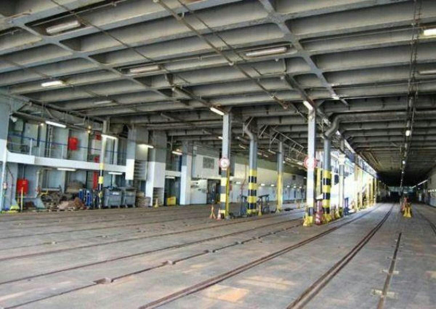 a train station with a few people aboard KAUNAS Yacht for Sale