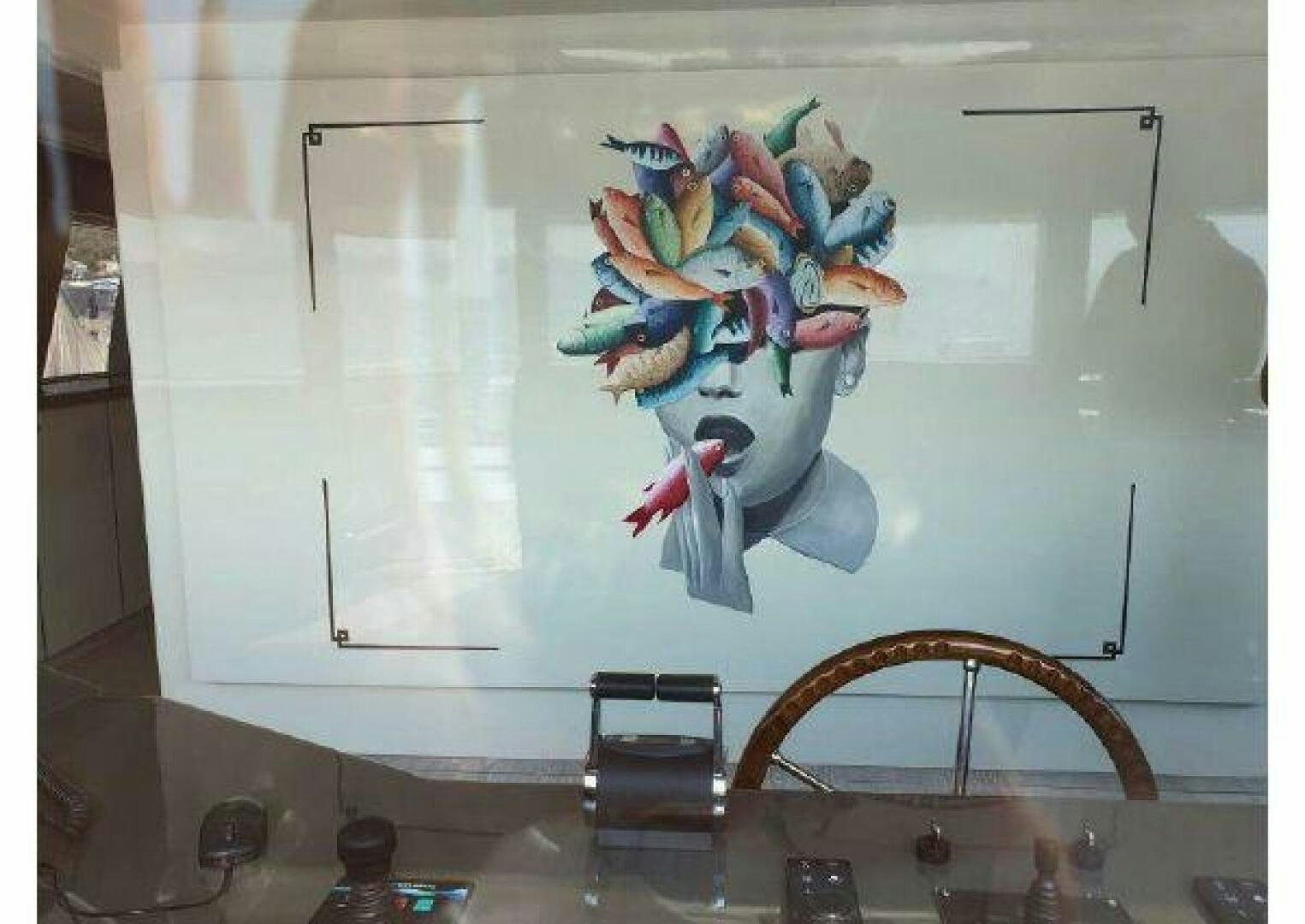 a vase with flowers on a table aboard VETRO Yacht for Sale