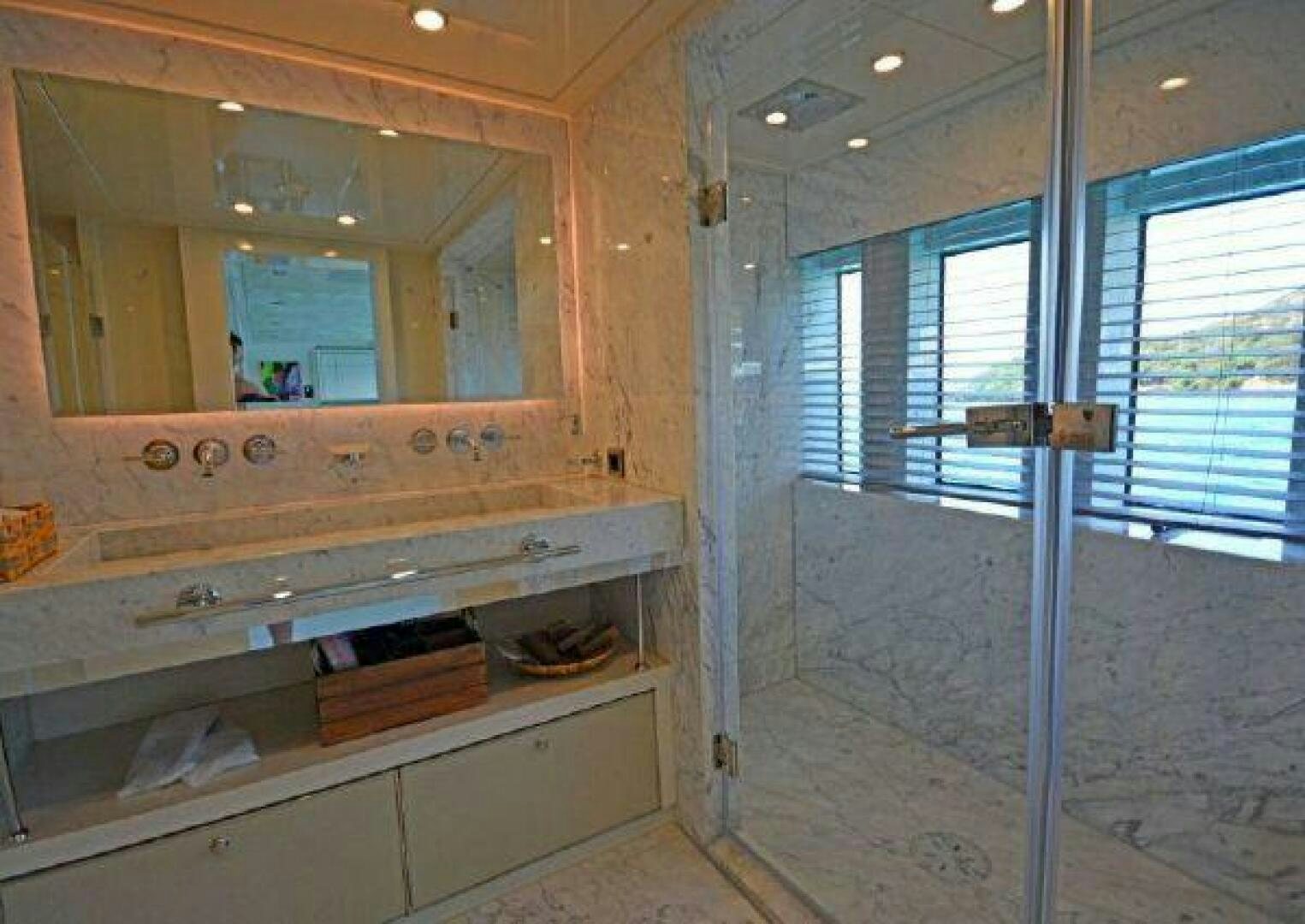 a room with a glass door aboard VETRO Yacht for Sale