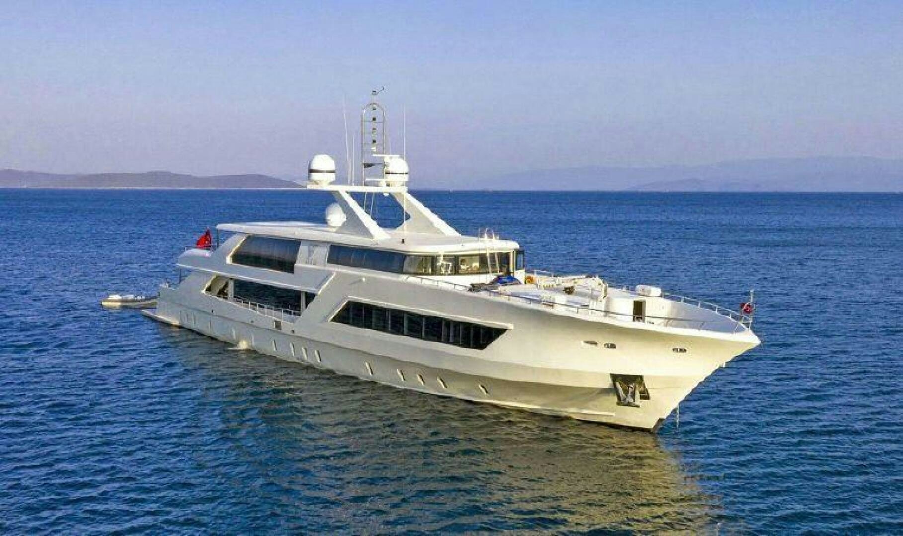 a white yacht in the water aboard VETRO Yacht for Sale