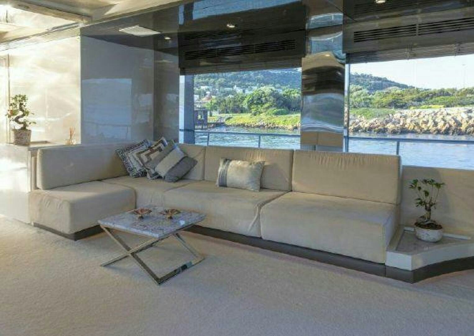 a couch in a room aboard VETRO Yacht for Sale
