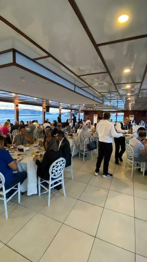 a group of people sitting at tables aboard DURU LIFE 1 Yacht for Sale