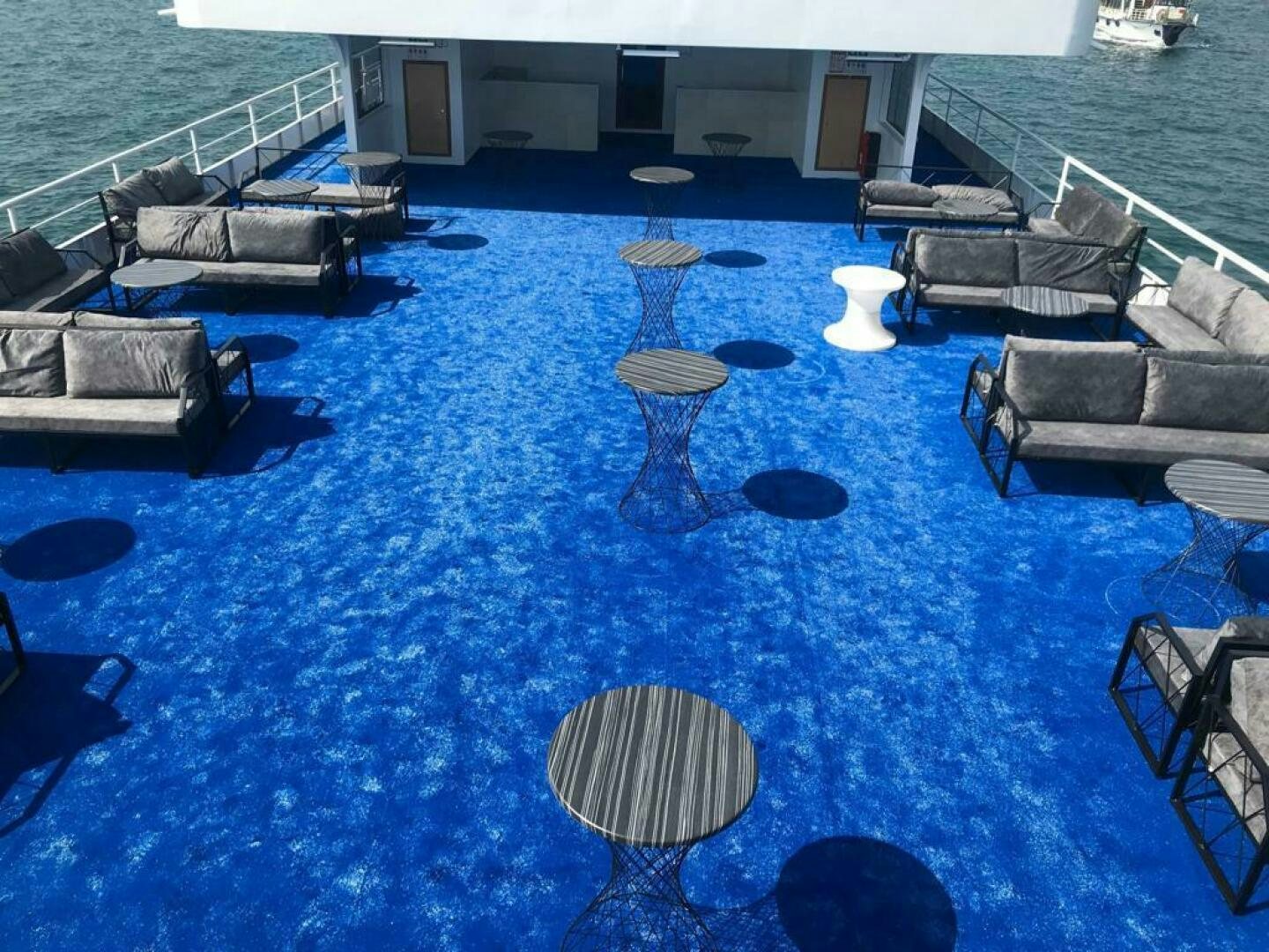 a pool with chairs and a table aboard DURU LIFE 1 Yacht for Sale