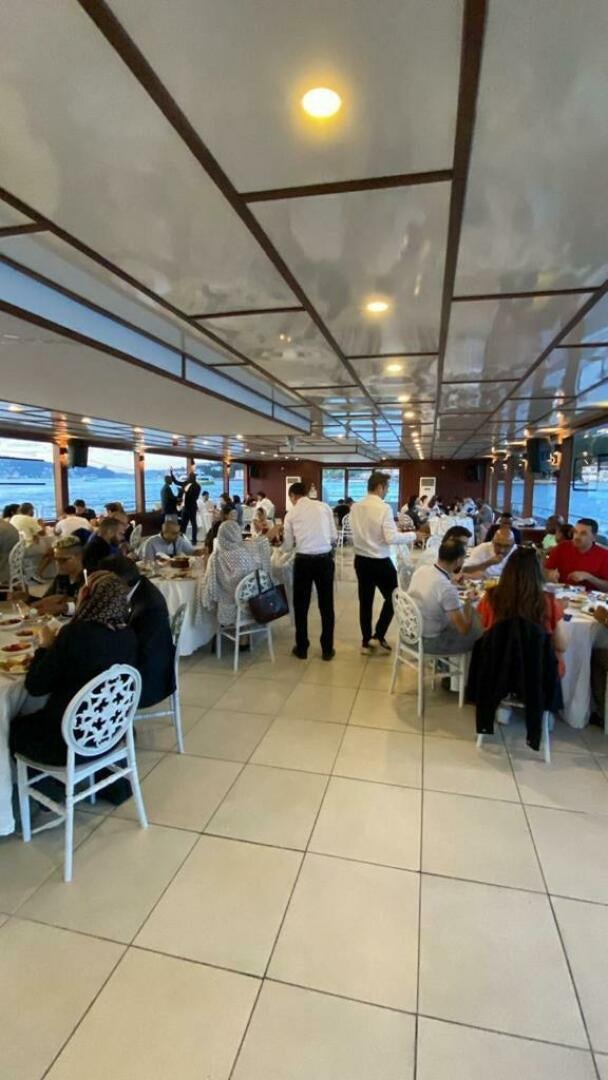 a group of people sitting in a room aboard DURU LIFE 1 Yacht for Sale