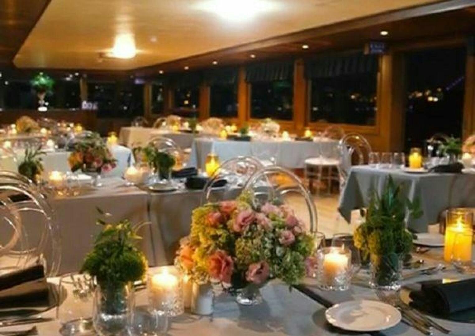 a table with many tables and chairs aboard BOSPHORUS PRINCESS Yacht for Sale
