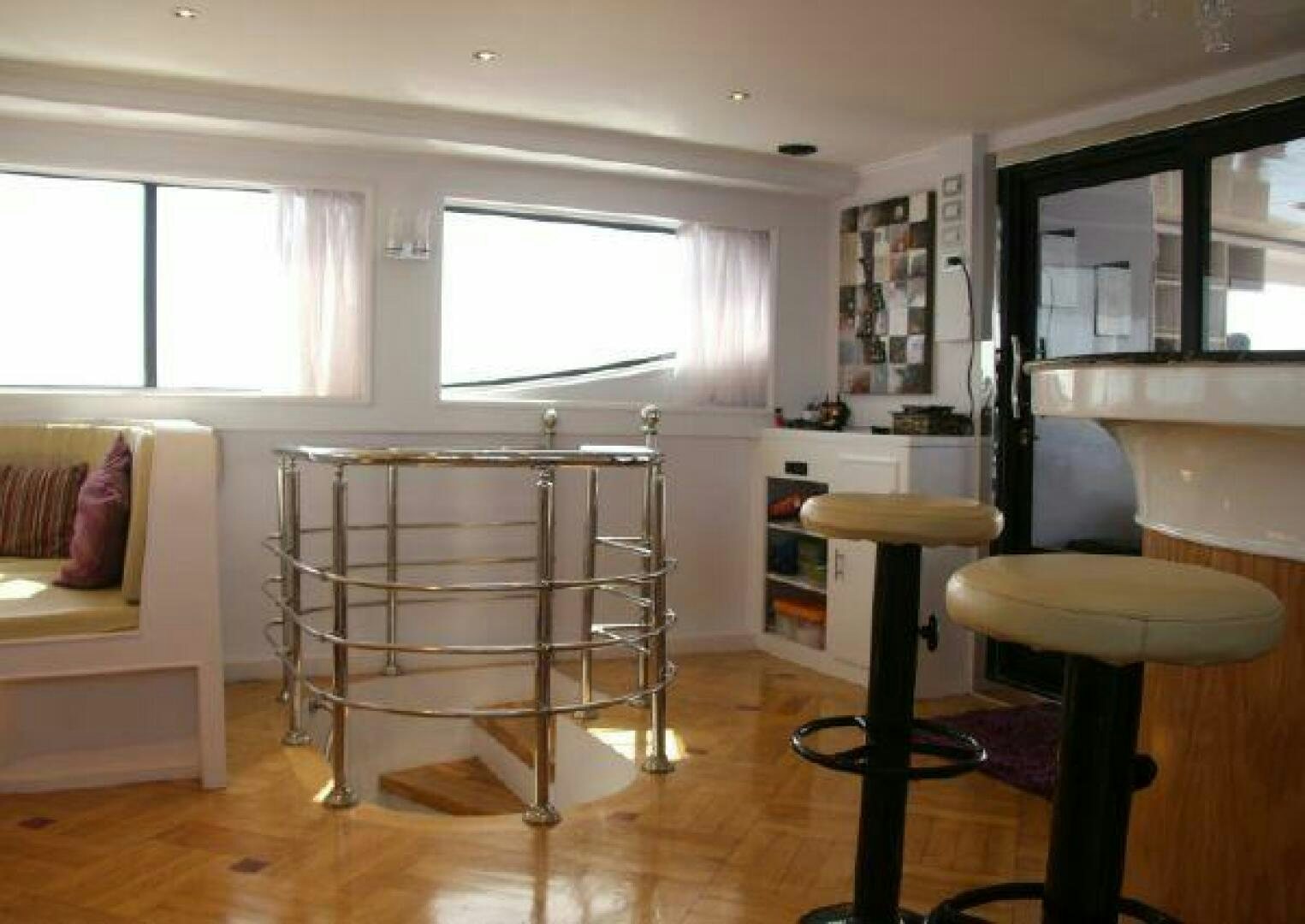 a room with stools and stools aboard RED SEA QUEEN Yacht for Sale